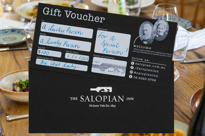 A Salopian Inn gift voucher on a dining table