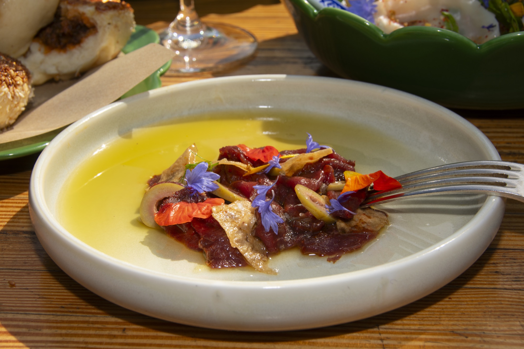 Carpaccio with colourful edible flowers at The Salopian Inn